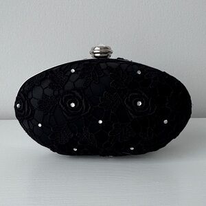 Sondra Roberts - black clutch